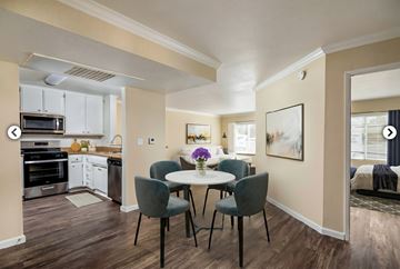 Woodland Hills apartment for rent - A kitchen with a dining table and chairs.