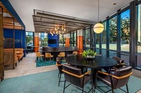 San Diego apartment for rent - A modern dining room with a large table and chairs.