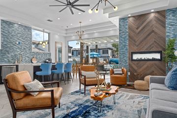 Phoenix apartment for rent - a living room with couches and chairs and a fireplace
