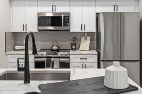 Glendale apartment for rent - A modern kitchen with a stove, oven, and refrigerator.