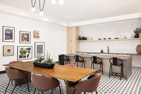 Denver apartment for rent - A dining room with a wooden table and chairs.