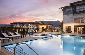 Colorado Springs apartment for rent - Swimming pool at dusk at The Allaso Peak, Colorado Springs
