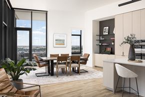 Denver apartment for rent - A modern dining room with a view of the city.