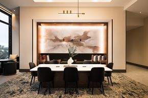 Denver apartment for rent - A modern dining room with a large table and chairs.