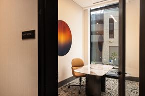 Denver apartment for rent - A conference room with a table and a chair.