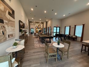 Porter apartment for rent - A large room with a long table and chairs.