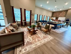 Porter apartment for rent - A living room with a sofa, chairs, and a rug.