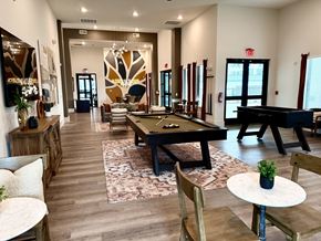 Porter apartment for rent - A room with a pool table and a piano.