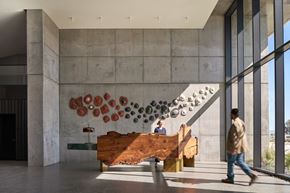 San Francisco apartment for rent - a large wooden piano sits in the lobby of a building