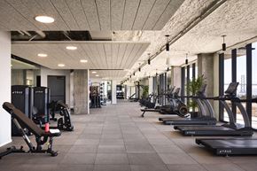San Francisco apartment for rent - a gym with weights and other exercise equipment in a room with windows