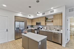 La Mesa apartment for rent - Kitchen with wood floors and stainless steel appliances at Array La Mesa, La Mesa