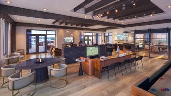 Clubhouse lounge with complementary coffee bar