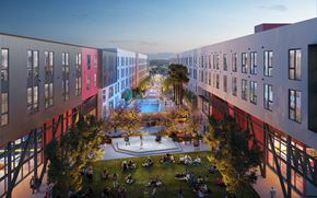Los Angeles apartment for rent - A modern building with a courtyard in the center of a grassy area.