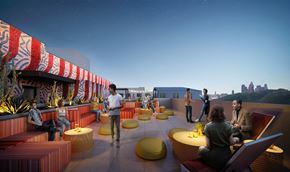Los Angeles apartment for rent - A group of people are sitting and standing on a rooftop terrace.
