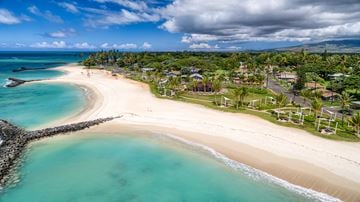 Ewa Beach apartment for rent - A beautiful beach with clear blue water and white sand.