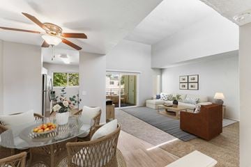 Sacramento apartment for rent - a living room and dining room with a glass table