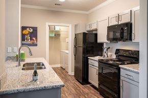 Baton Rouge apartment for rent - Well Organized Kitchen at Dusk at Blu on the Boulevard, Baton Rouge, LA