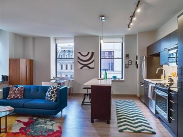 Philadelphia apartment for rent - a kitchen and living room with a blue couch