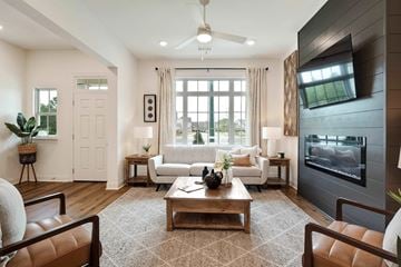 Collierville apartment for rent - A modern living room with a brown rug and a white sofa.