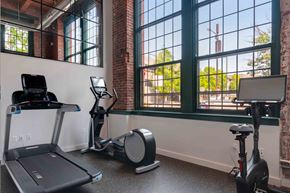 Philadelphia apartment for rent - Fitness center with treadmill, elliptical, and cycling bike.