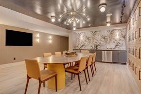 Salt Lake City apartment for rent - A modern dining room with a round table and chairs.
