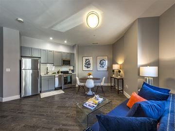 Worcester apartment for rent - a living room and kitchen with a couch and a table