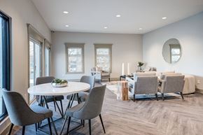 Louisville apartment for rent - a dining room with a table and chairs and a living room