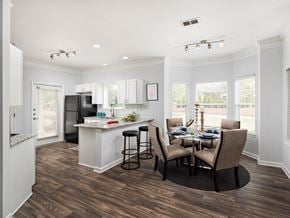 Mcdonough apartment for rent - a kitchen and dining room with a table and chairs