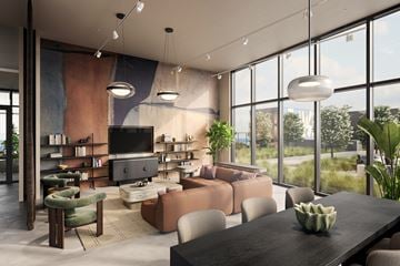 Nashville apartment for rent - A modern living room with a large television and comfortable seating.