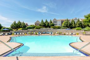 Louisville apartment for rent - our resort style swimming pool is in front of our building with trees