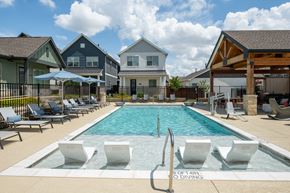 Arlington apartment for rent - Lounge chairs around the pool at Mission at Johnson Creek, Texas