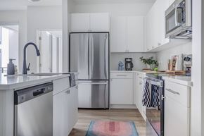 South Salt Lake apartment for rent - Kitchen with stainless steel appliances at One Burton new luxury apartment in Salt Lake City.
