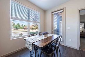 Littleton apartment for rent - A dining room with a table and chairs.