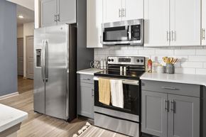 Charleston apartment for rent - A modern kitchen with a stainless steel refrigerator and oven.