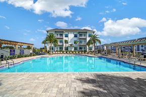 Destin apartment for rent - Resort-style swimming pool and apartment building at The Charles in Destin, Florida
