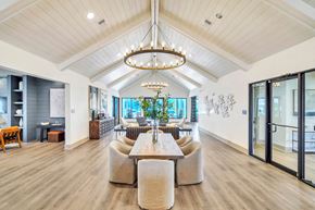 Destin apartment for rent - Elegant resident lounge with comfortable seating and modern coastal-inspired décor