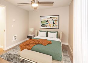 Vancouver apartment for rent - A bedroom with a bed, a nightstand, and a painting on the wall at Aspenridge Apartments,Washington 98683