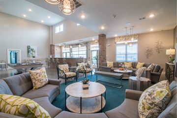 Myrtle Beach apartment for rent - A living room with a grey couch and a coffee table.