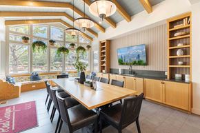 Highlands Ranch apartment for rent - A dining room with a long table and chairs.