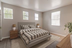 San Ramon apartment for rent - A bedroom with a large bed and two windows.