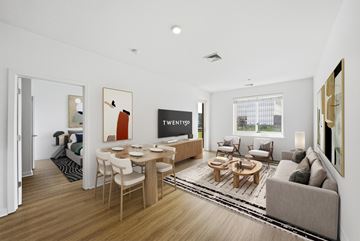 Fort Lee apartment for rent - A modern living room with a dining table and a couch.