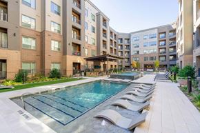 Frisco apartment for rent - pool with lounge chairs, covered grilling and game area