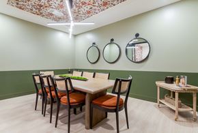 Oklahoma City apartment for rent - A dining room with a table set for four.