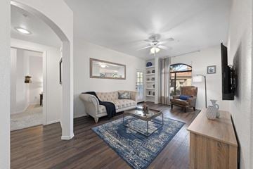 Chandler apartment for rent - a living room with furniture and a ceiling fan
