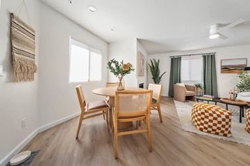 Chandler apartment for rent - a dining room and living room with a table and chairs