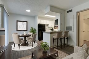 San Antonio apartment for rent - A modern kitchen with a dining table and chairs.