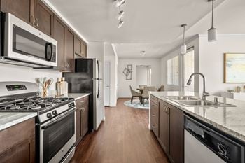 Contemporary black & stainless steel appliances
