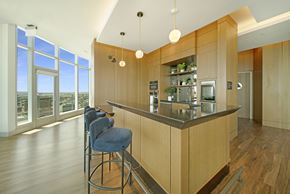 Long Beach apartment for rent - a kitchen with an island and stools