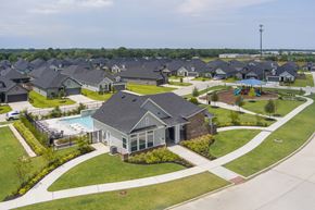Cypress apartment for rent - A residential area with houses and a swimming pool.