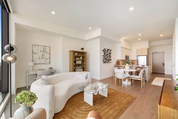 Los Angeles apartment for rent - a living room with a couch and a table